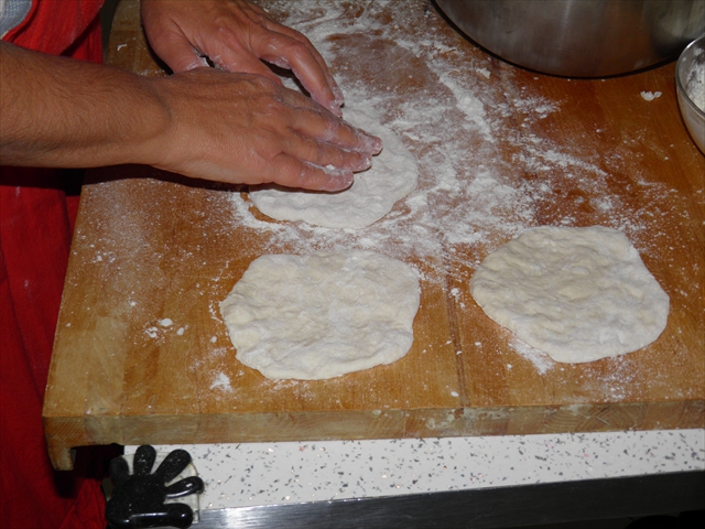 Mould the dough into disks roughly 6 inches (15 cm) in diameter
