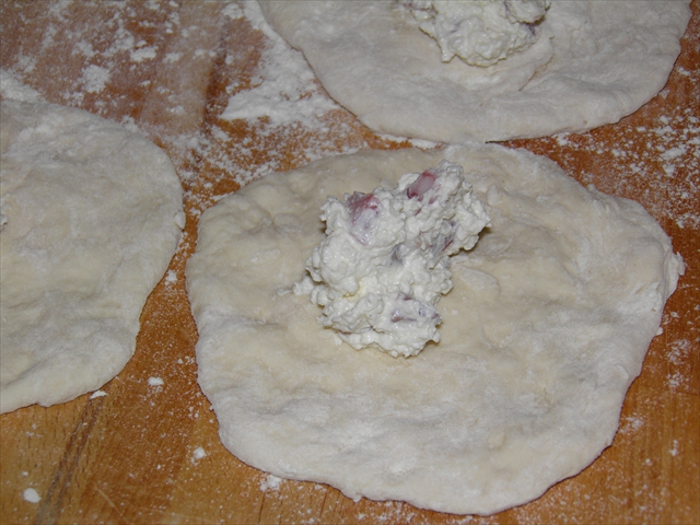 Add ricotta cheese, salami and fior di latte (mozzarella-like cheese)