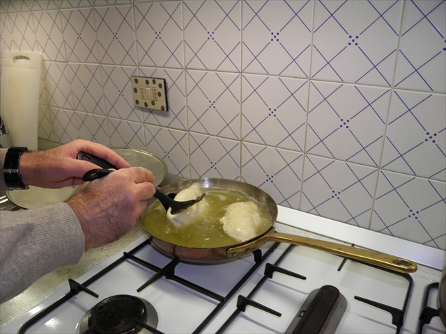 Deep frying in boiling oil causes the pizza to inflate